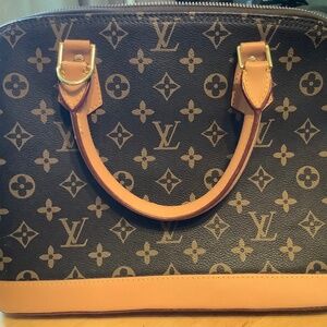 Louis Vuitton Alma handbag
